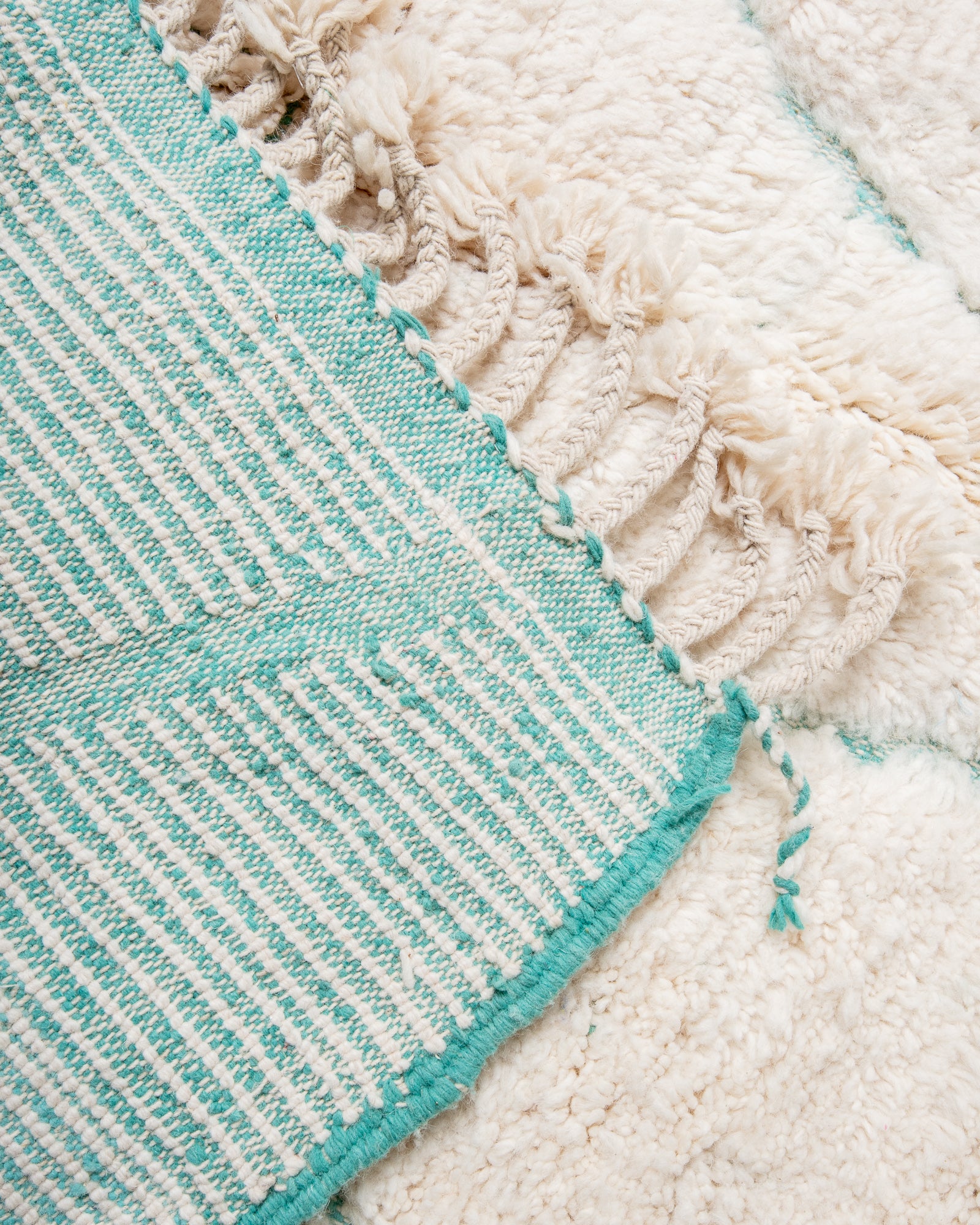 Modern, designer, handcrafted Berber rug from Morocco. Beniourain carpet with beautiful colours and patterns and fluffy wool texture.